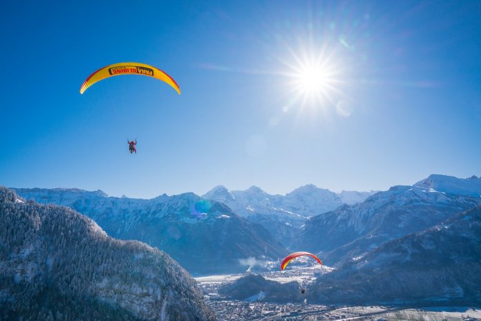 Paragliding over Interlaken during winter